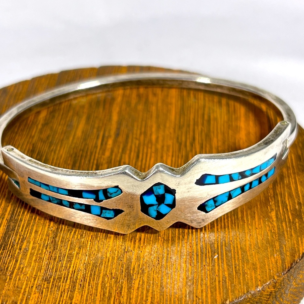 Absolutely stunning Sterling silver and inlaid turquoise bracelet.